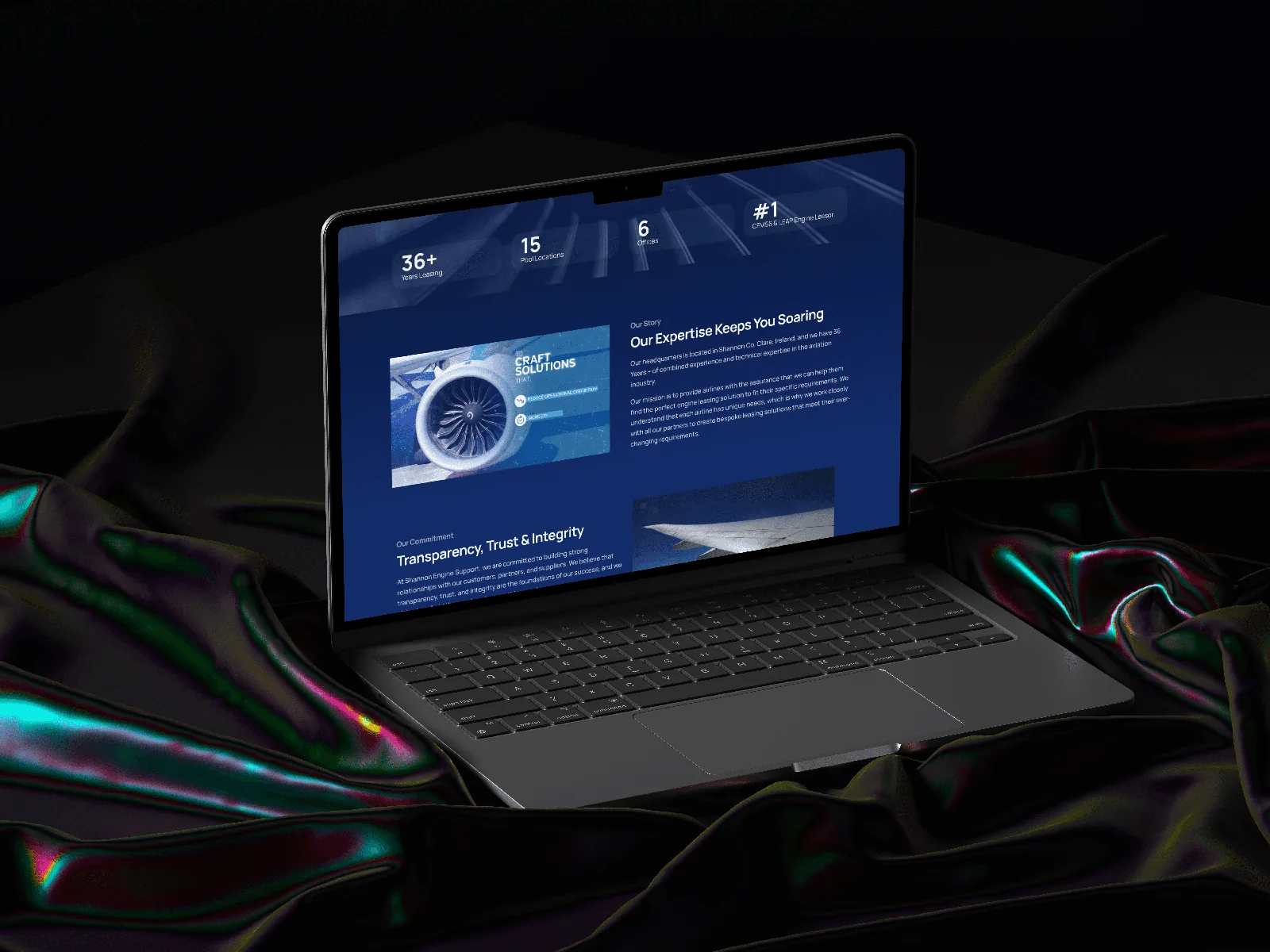 Laptop displaying a professional website design for an aviation company.