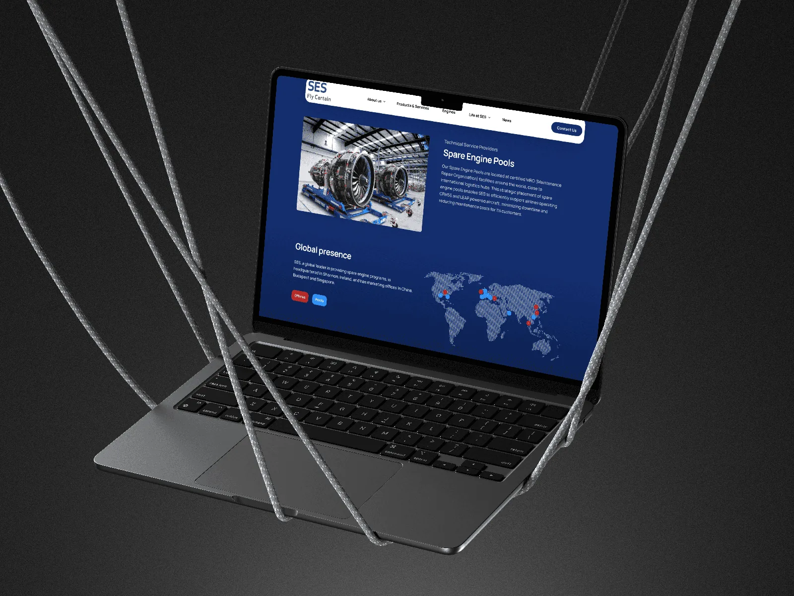 Laptop displaying a professional business website by Graphic House.