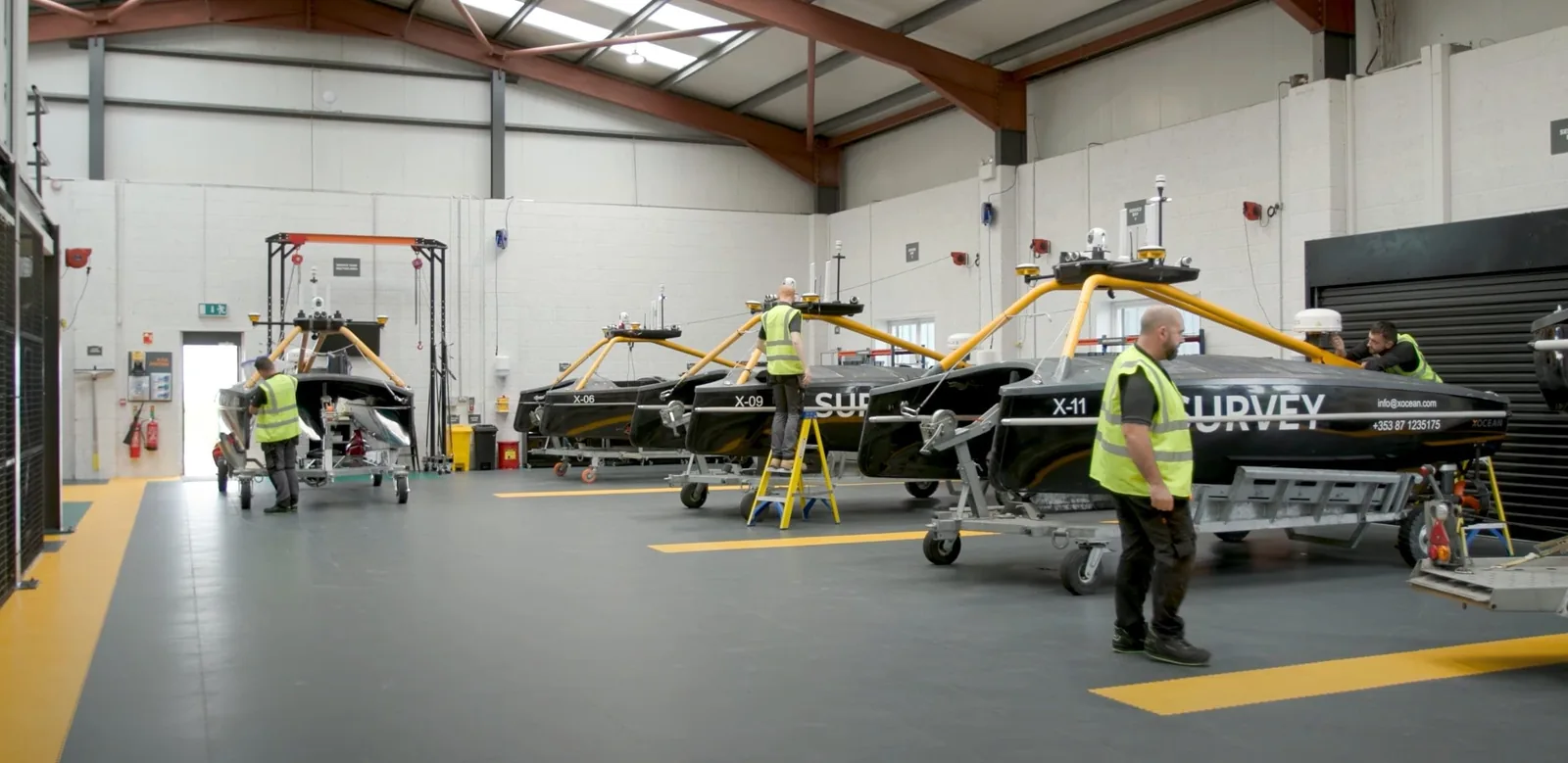 Engineers maintain survey vessels, representing businesses served by website design.